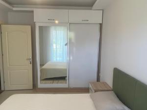 Postel nebo postele na pokoji v ubytování Konyaaltı tatil evleri & konaklama Türkiye - Antalya