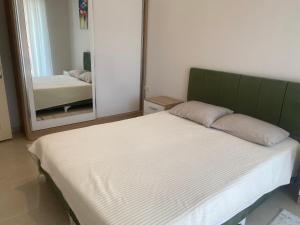 Postel nebo postele na pokoji v ubytování Konyaaltı tatil evleri & konaklama Türkiye - Antalya