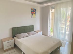 Postel nebo postele na pokoji v ubytování Konyaaltı tatil evleri & konaklama Türkiye - Antalya