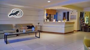 Uma área de estar em Cóndor Suites Apart Hotel
