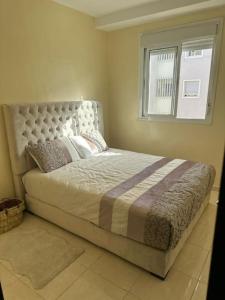 Ένα ή περισσότερα κρεβάτια σε δωμάτιο στο Well-equipped luxury apartment