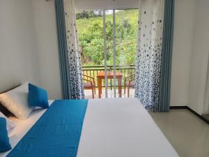 Postel nebo postele na pokoji v ubytování Onel Rest Inn