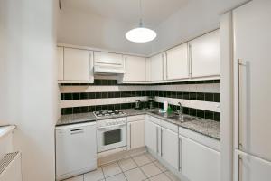 Kuchyňa alebo kuchynka v ubytovaní U Kapra Apartments