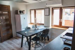 Kuchyňa alebo kuchynka v ubytovaní Kosmos 9 - Apartament Astro by Rentoom