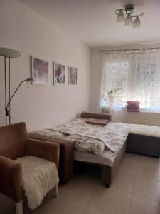 Postel nebo postele na pokoji v ubytování Anastasija Lux 3