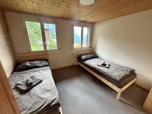 Krevet ili kreveti u jedinici u objektu Chalet Luegistal