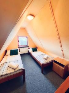 Postel nebo postele na pokoji v ubytování U Aniołka BASEN, SAUNA, JACUZZI W CENIE !