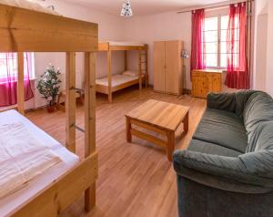 Postel nebo postele na pokoji v ubytování Fit und Fun Sportherberge