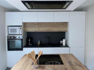 Kuchyň nebo kuchyňský kout v ubytování Maison La Lensoise - 4 chambres - Stade Bollaert