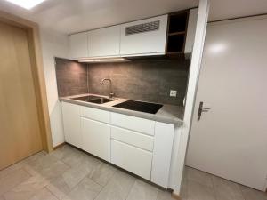Kuhinja ili čajna kuhinja u objektu Chalet Luegistal