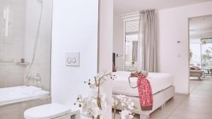 Ein Badezimmer in der Unterkunft Hotel Baobab Suites