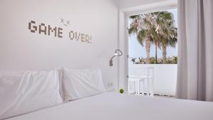 Ein Bett oder Betten in einem Zimmer der Unterkunft Hotel Baobab Suites