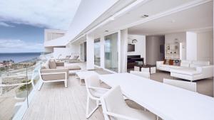 Ein Sitzbereich in der Unterkunft Hotel Baobab Suites