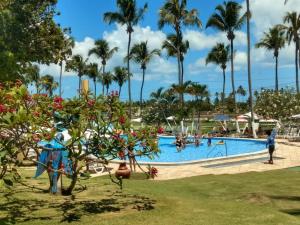 a pool at the resort at Casa do Lago Fiore in Paripueira