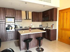 Cuina o zona de cuina de Holiday Apartment in Marsaskala