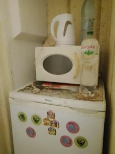 Kuchyň nebo kuchyňský kout v ubytování Квартира в центре.