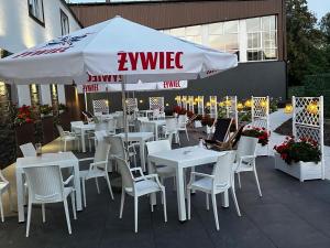 WRZOS resort & wellness **** DOMKI CAŁOROCZNE餐厅或其他用餐的地方