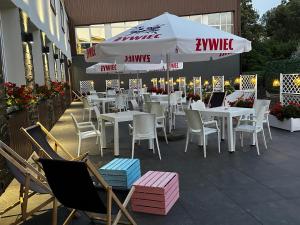 WRZOS resort & wellness **** DOMKI CAŁOROCZNE餐厅或其他用餐的地方