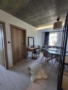 Posezení v ubytování USTROŃ RESIDENCE by VillaOlimpijska2
