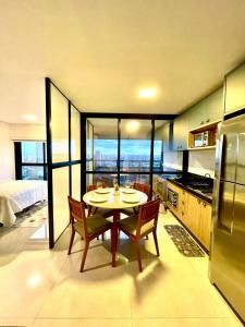 Una cama o camas en una habitación de Flat Alto, Completo e com Linda Vista no Vertigo