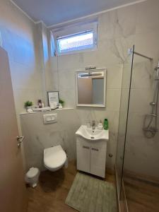 Koupelna v ubytování Bliss city apartments-Taurunum2 + 40 fotografií