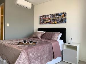 Cama o camas de una habitación en Studios Sampa - Parque Augusta