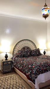 Ένα ή περισσότερα κρεβάτια σε δωμάτιο στο Raid Maison H