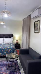 Ένα ή περισσότερα κρεβάτια σε δωμάτιο στο Raid Maison H