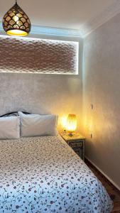 Ένα ή περισσότερα κρεβάτια σε δωμάτιο στο Raid Maison H +5 φωτογραφίες