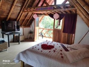 Postel nebo postele na pokoji v ubytování Villa Ester Hostel Vereda Cay