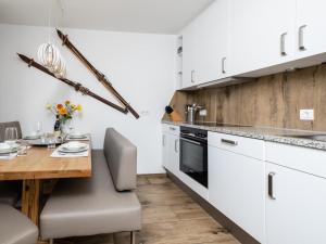 Kuchyň nebo kuchyňský kout v ubytování Sonnen Lodge Kaprun