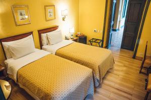 Ένα ή περισσότερα κρεβάτια σε δωμάτιο στο Hotel De La Opera +97 φωτογραφίες