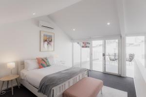 Ένα ή περισσότερα κρεβάτια σε δωμάτιο στο Spacious Modern Terrace in the Heart of Hobart CBD