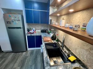 Kuchyň nebo kuchyňský kout v ubytování Cancun-Soho