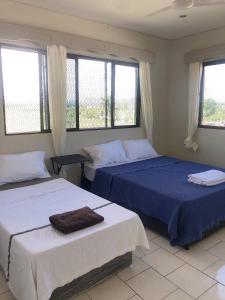 Postel nebo postele na pokoji v ubytování ideal airport rooms
