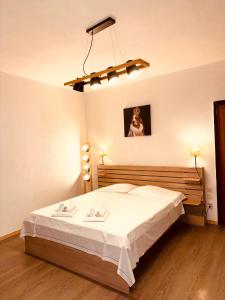 Postel nebo postele na pokoji v ubytování B&B Gino