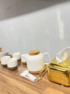a counter with various items on a table at Acc Family Homestay in Takengon