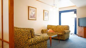 Posezení v ubytování Hotel BELLMARE ホテルベルマーレ