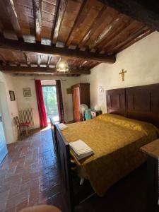Postel nebo postele na pokoji v ubytování Poggio Alla Pieve Relais