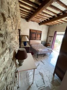 Postel nebo postele na pokoji v ubytování Poggio Alla Pieve Relais