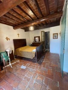 Postel nebo postele na pokoji v ubytování Poggio Alla Pieve Relais