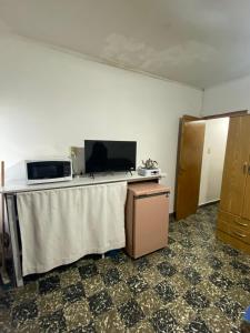 TV a/nebo společenská místnost v ubytování Departamento Pía II