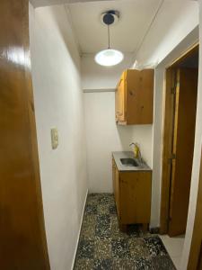 Kuchyň nebo kuchyňský kout v ubytování Departamento Pía II