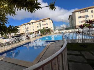 Swimmingpoolen hos eller tæt på Apto aconchegante e lindo