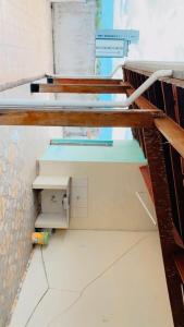 an empty room with stairs at Apartamento em frente a basílica 02 in Aparecida