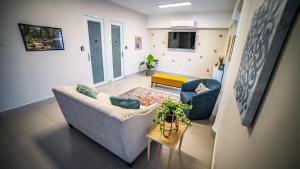 Μια τηλεόραση ή/και κέντρο ψυχαγωγίας στο Melao Lodge