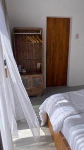 Ένα ή περισσότερα κρεβάτια σε δωμάτιο στο Griyo Antik Villa