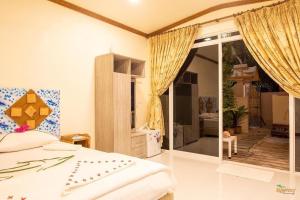Letto o letti in una camera di Summer Vibes Beach Front