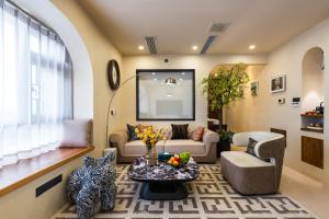 Posezení v ubytování Guangzhou He She Art Apartment