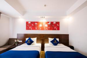 Postel nebo postele na pokoji v ubytování Sandals Lily Hotel + 37 fotografií